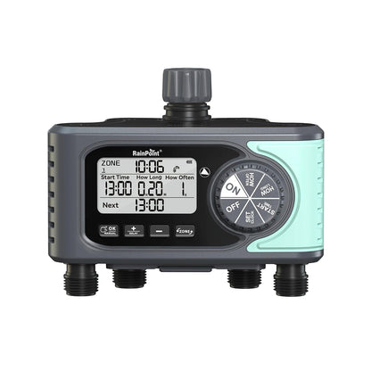 Irrigation system with four outlets in a garden setting.